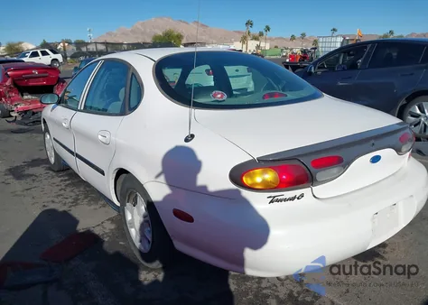 1996 Ford Taurus G из США, поврежденный, VIN 1FALP51U6TA287324